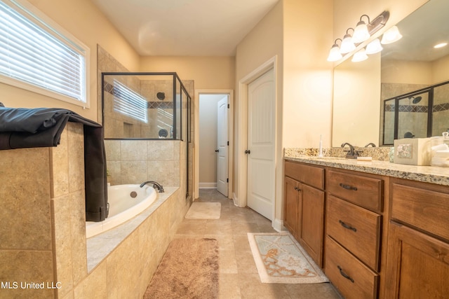 bathroom featuring vanity, plus walk in shower, and tile patterned floors