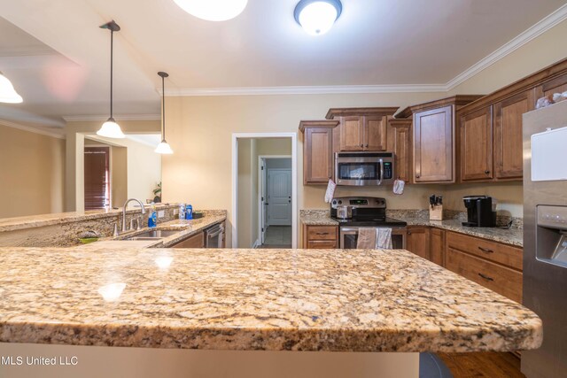 kitchen with kitchen peninsula, hanging light fixtures, sink, crown molding, and stainless steel appliances