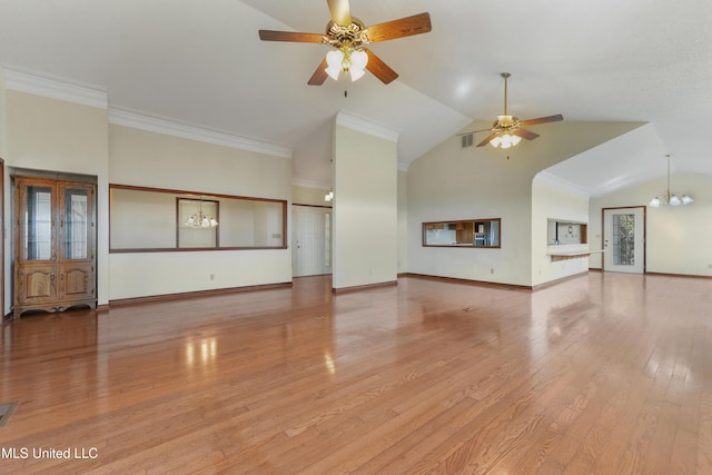 unfurnished living room featuring vaulted ceiling, crown molding, light hardwood / wood-style flooring, and ceiling fan with notable chandelier