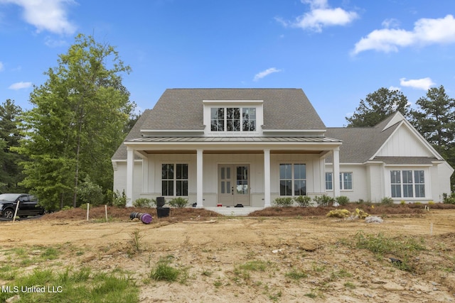 184 Harbor View Dr, Madison, MS 39110 - back of property featuring a standing seam roof, covered porch, board and batten siding, metal roof, and roof with shingles