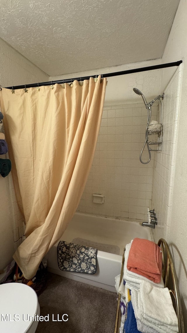 211 Boyd St, Ridgeland, MS 39157 - bathroom with a textured ceiling, shower / bath combo, and a textured wall