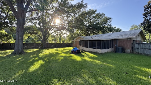 211 Boyd St, Ridgeland, MS 39157 - fenced backyard featuring a sunroom