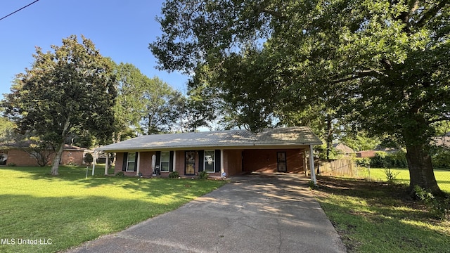 211 Boyd St, Ridgeland, MS 39157 - single story home with driveway and an attached carport