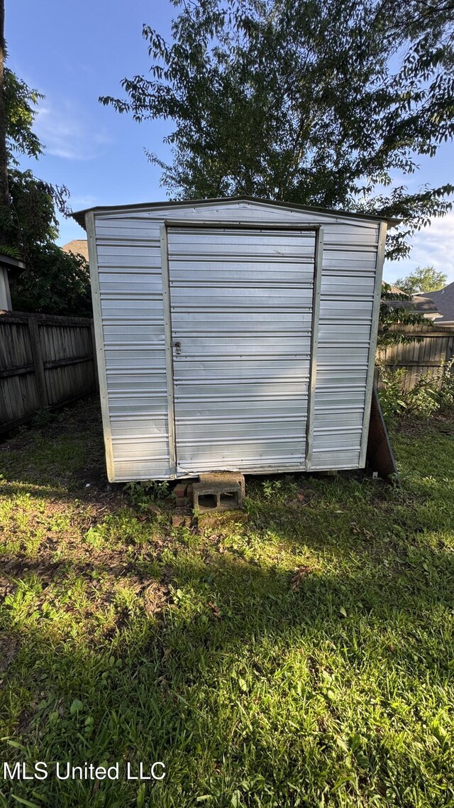 211 Boyd St, Ridgeland, MS 39157 - view of shed with a fenced backyard