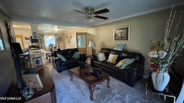 211 Boyd St, Ridgeland, MS 39157 - carpeted living area with ceiling fan, crown molding, and decorative columns