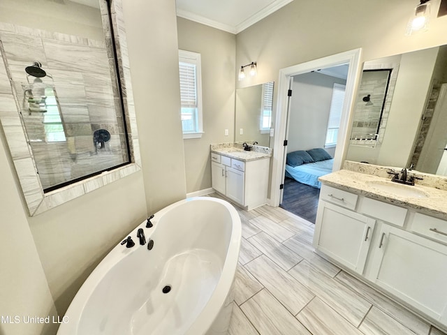 3464 Delaney Dr, Nesbit, MS 38651 - full bathroom with a soaking tub, ornamental molding, a tile shower, and two vanities