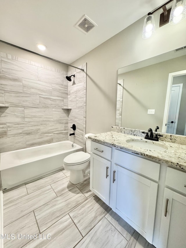3464 Delaney Dr, Nesbit, MS 38651 - bathroom featuring toilet, vanity, shower / bath combination, and marble look tile flooring