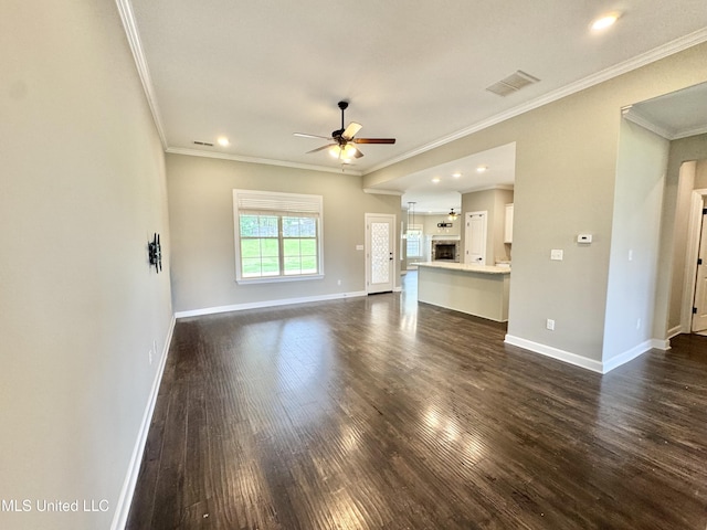 3464 Delaney Dr, Nesbit, MS 38651 - unfurnished living room with a ceiling fan, dark wood finished floors, baseboards, crown molding, and recessed lighting