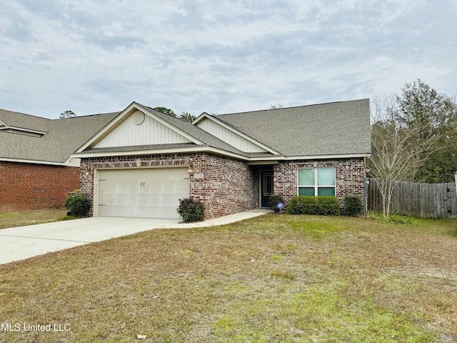 view of front of home with a garage, brick siding, fence, concrete driveway, and a front yard