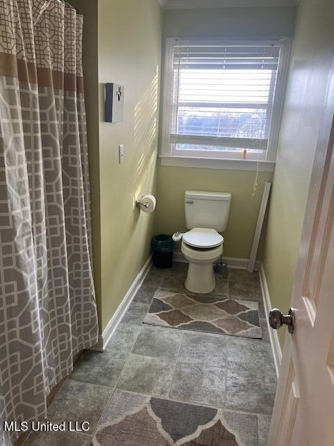 bathroom featuring toilet