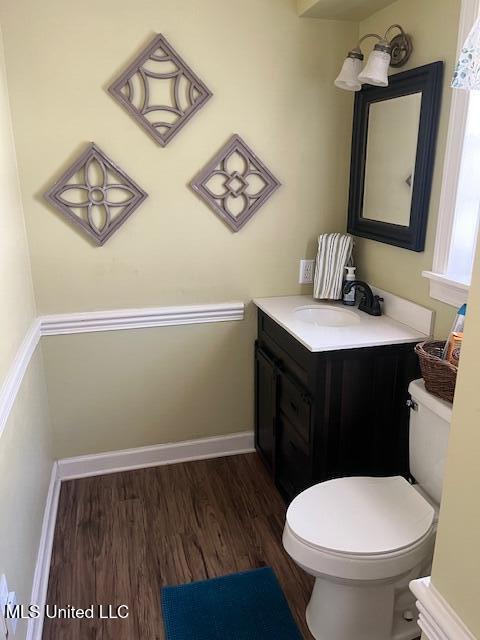 715 Sumner Ave, Greenwood, MS 38930 - bathroom featuring vanity and wood finished floors