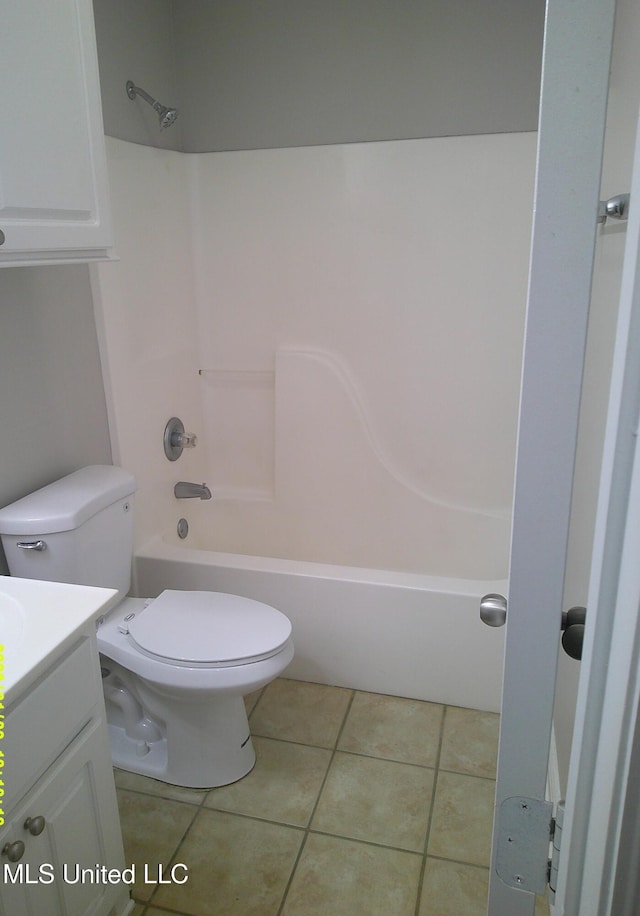 full bathroom featuring tile patterned floors, vanity, shower / bathtub combination, and toilet