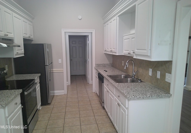 kitchen featuring sink, white cabinets, stainless steel appliances, and light tile patterned floors