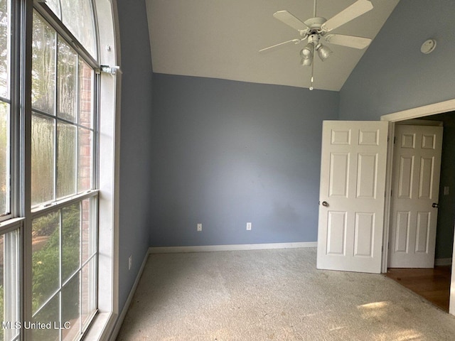 104 Warrior Ln, Clinton, MS 39056 - empty room featuring carpet, plenty of natural light, a ceiling fan, and lofted ceiling