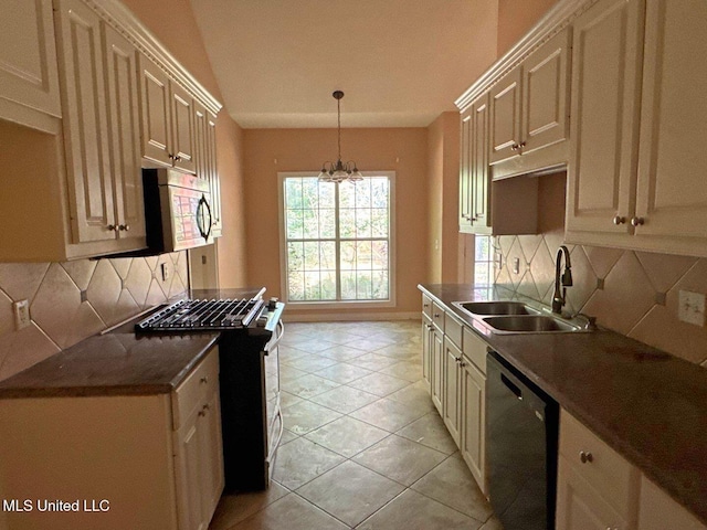 104 Warrior Ln, Clinton, MS 39056 - kitchen featuring appliances with stainless steel finishes, a sink, backsplash, baseboards, and a chandelier