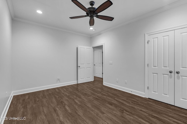 unfurnished bedroom featuring recessed lighting, crown molding, baseboards, and dark wood-style flooring