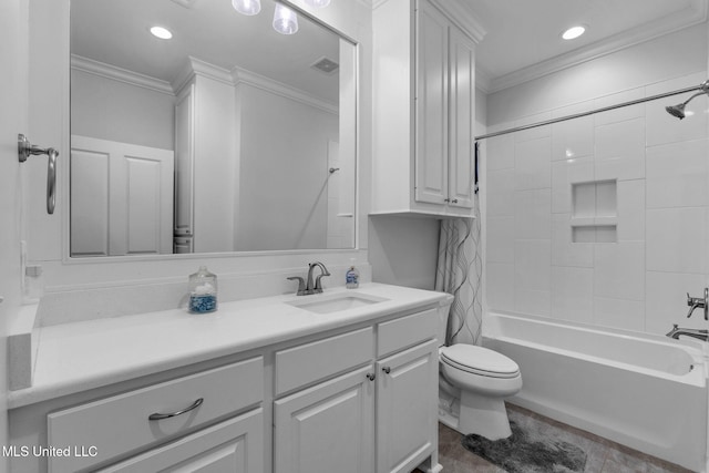 bathroom with visible vents, vanity, crown molding, and toilet