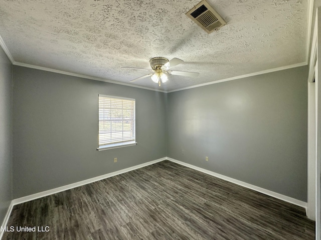 spare room featuring a ceiling fan, baseboards, visible vents, dark wood-style floors, and crown molding