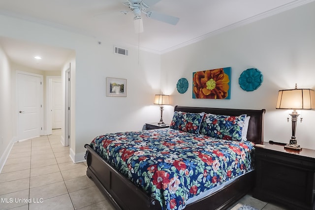 tiled bedroom with ceiling fan and ornamental molding