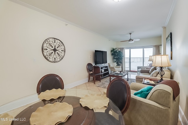 tiled living room featuring ceiling fan and ornamental molding