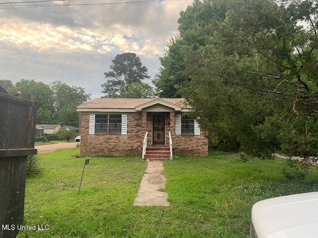 2226 Oak Park Dr, Jackson, MS 39213 - view of front of property featuring a front yard and brick siding