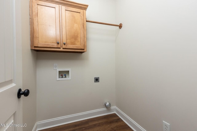 laundry area featuring electric dryer hookup, dark hardwood / wood-style flooring, cabinets, and washer hookup