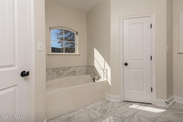 bathroom with a washtub