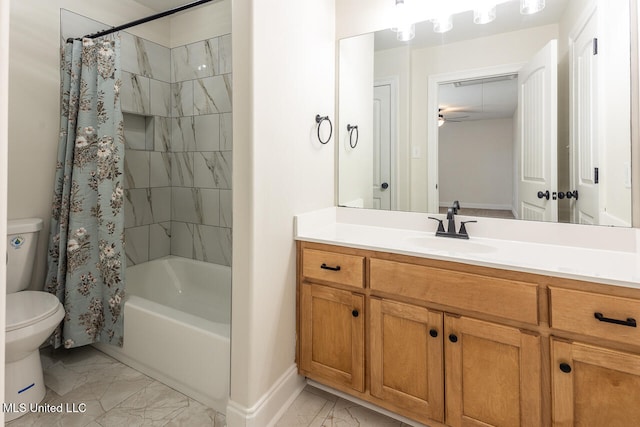 full bathroom featuring ceiling fan, shower / tub combo with curtain, vanity, and toilet