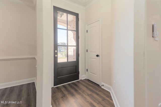 doorway to outside featuring dark hardwood / wood-style flooring and crown molding