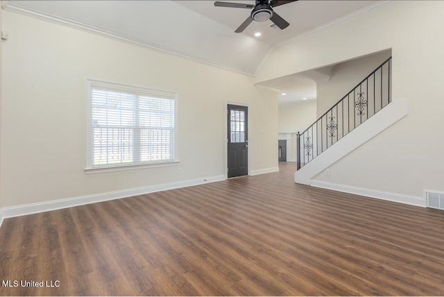 unfurnished living room with ceiling fan, ornamental molding, and vaulted ceiling