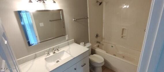 full bathroom with vanity, toilet, and shower / bathtub combination