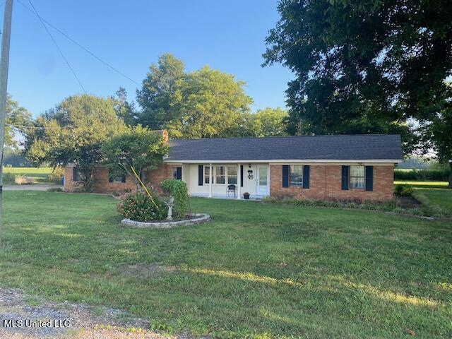 710 Eubanks Rd, Alligator, MS 38720 - ranch-style house with a front lawn