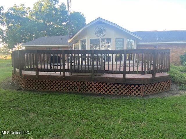 710 Eubanks Rd, Alligator, MS 38720 - rear view of property with a yard and a deck