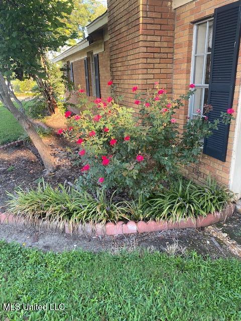 710 Eubanks Rd, Alligator, MS 38720 - view of property exterior featuring brick siding