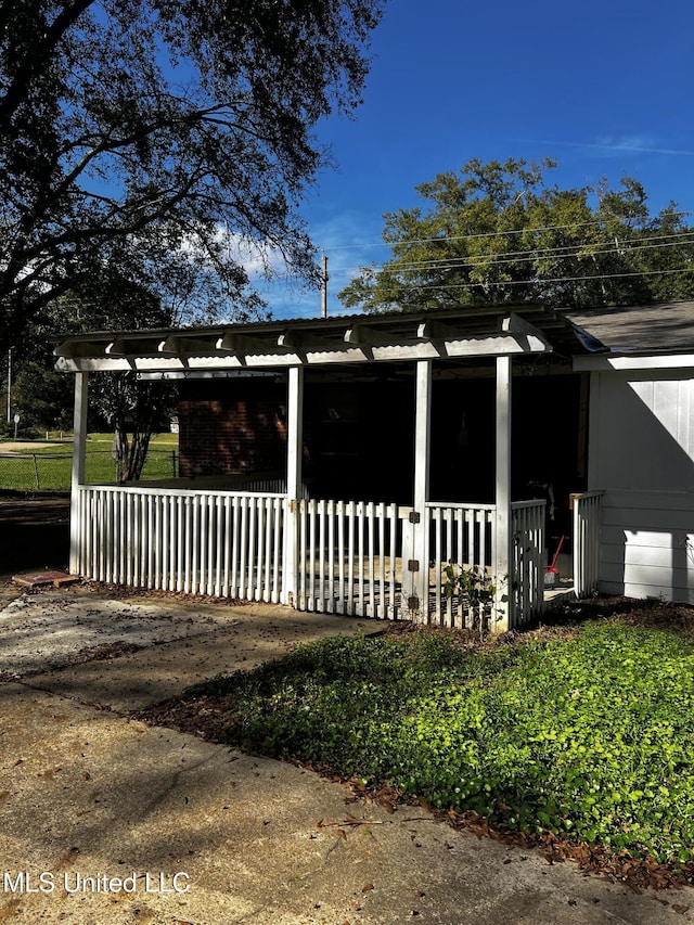 exterior space featuring covered porch