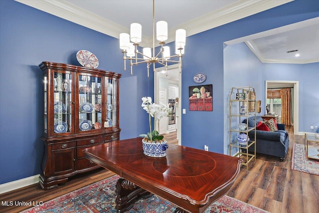 611 Berridge Dr, Ridgeland, MS 39157 - dining space with wood finished floors, crown molding, a chandelier, and baseboards