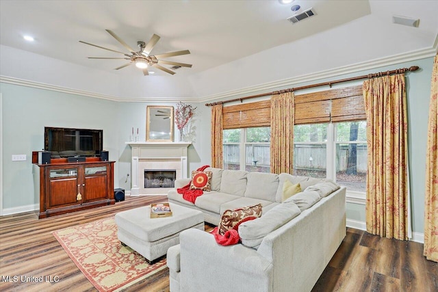 611 Berridge Dr, Ridgeland, MS 39157 - living area featuring ceiling fan, dark wood-style flooring, a fireplace, and baseboards
