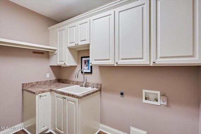 611 Berridge Dr, Ridgeland, MS 39157 - laundry room featuring cabinet space, washer hookup, hookup for an electric dryer, and baseboards
