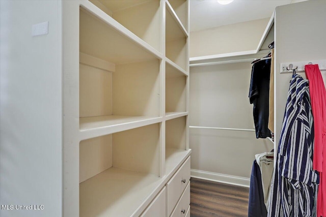 611 Berridge Dr, Ridgeland, MS 39157 - spacious closet with dark wood-style floors