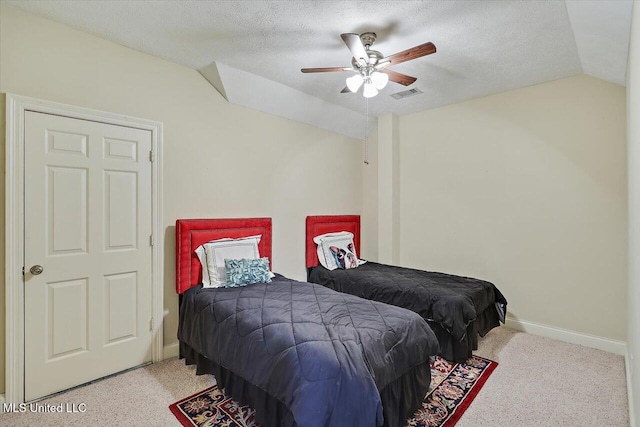 611 Berridge Dr, Ridgeland, MS 39157 - bedroom with carpet, vaulted ceiling, baseboards, a ceiling fan, and a textured ceiling