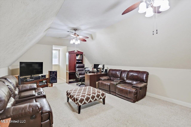 611 Berridge Dr, Ridgeland, MS 39157 - living room with ceiling fan, vaulted ceiling, baseboards, carpet flooring, and a textured ceiling