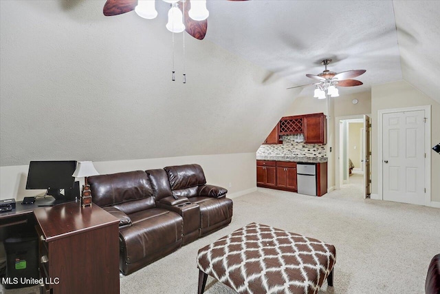 611 Berridge Dr, Ridgeland, MS 39157 - living room featuring ceiling fan, vaulted ceiling, light carpet, baseboards, and an office area