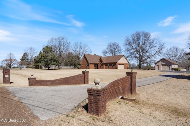 view of road with driveway