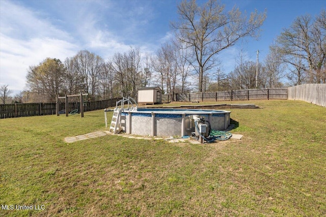 view of yard featuring a fenced backyard, a shed, an outdoor structure, and a fenced in pool