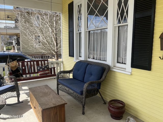 view of patio featuring a porch