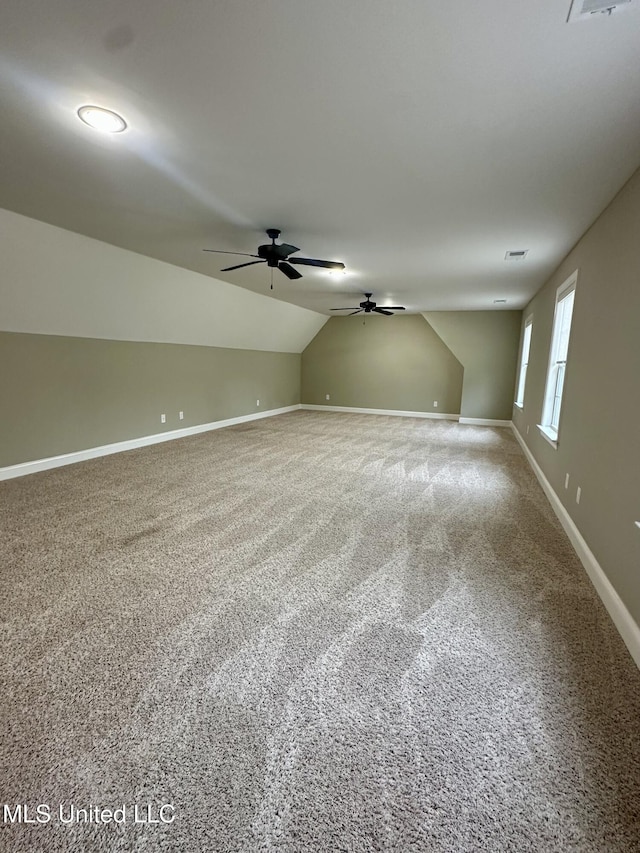 4049 Courtyard Dr, Southaven, MS 38671 - bonus room featuring lofted ceiling, carpet floors, a ceiling fan, and baseboards
