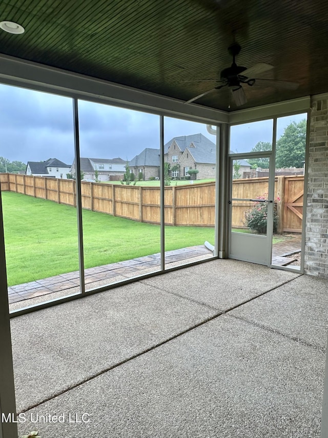 4049 Courtyard Dr, Southaven, MS 38671 - unfurnished sunroom with ceiling fan and a residential view