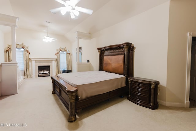 104 Overbrook Hl, Ridgeland, MS 39157 - carpeted bedroom with vaulted ceiling, a tile fireplace, and a ceiling fan