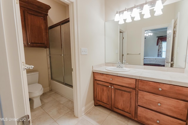104 Overbrook Hl, Ridgeland, MS 39157 - full bath featuring tile patterned floors, connected bathroom, vanity, and shower / bath combination with glass door