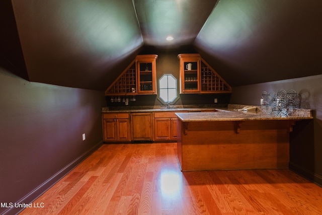 104 Overbrook Hl, Ridgeland, MS 39157 - bar featuring light wood finished floors and lofted ceiling